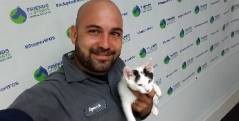 Total Air technician helping shelter